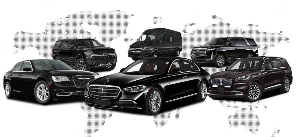A convoy of black cars parked in front of a world map at Trenton airport.